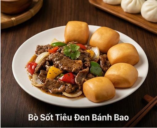 Bò Sốt Tiêu Đen Bánh Bao - Bò mềm thấm đẫm sốt tiêu đen thơm nồng, ăn kèm bánh bao chiên.